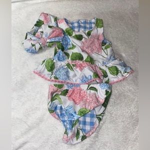 Reversible girls swim suit set. Bottoms, top and bow.